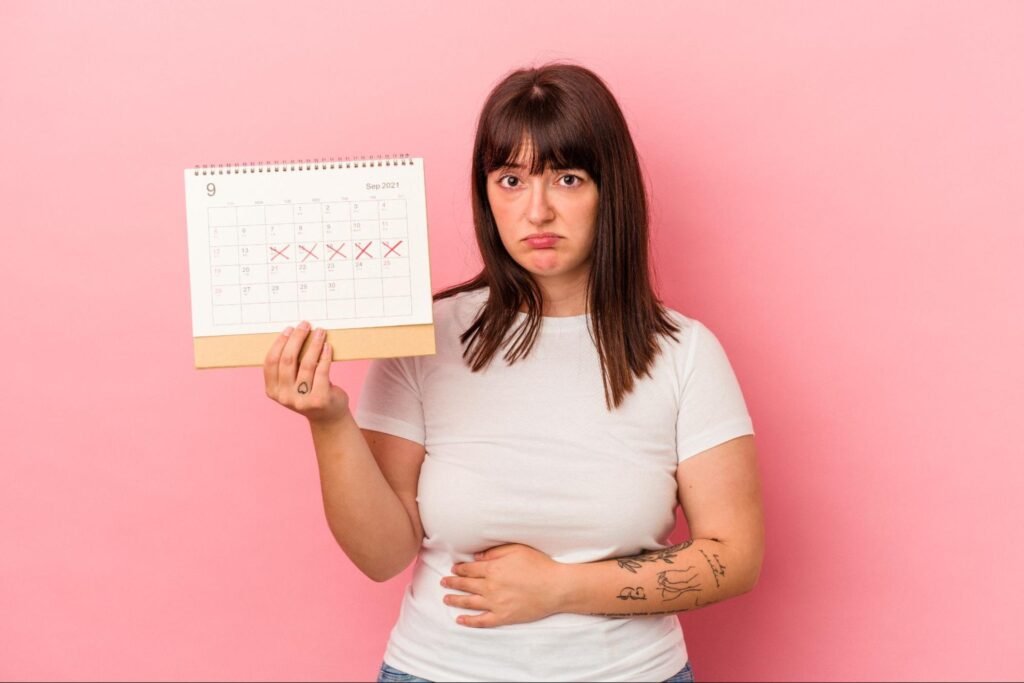 Woman worried about not getting pregnant despite regular periods