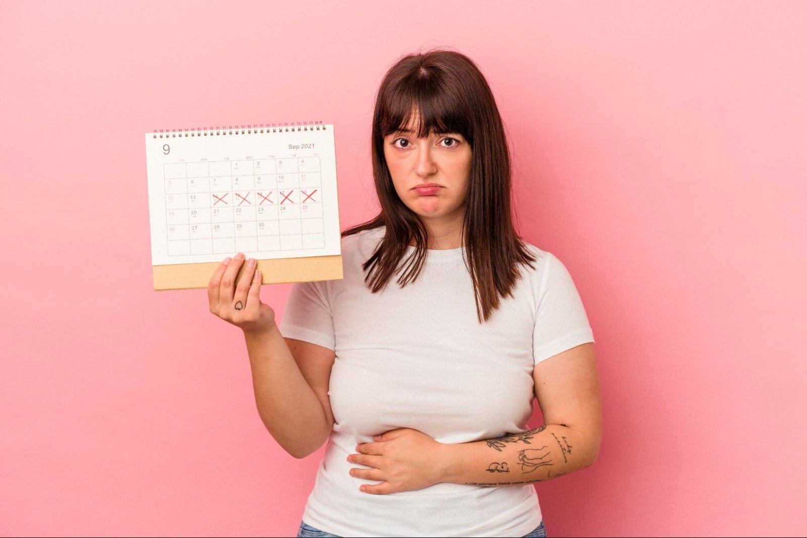 Woman worried about not getting pregnant despite regular periods
