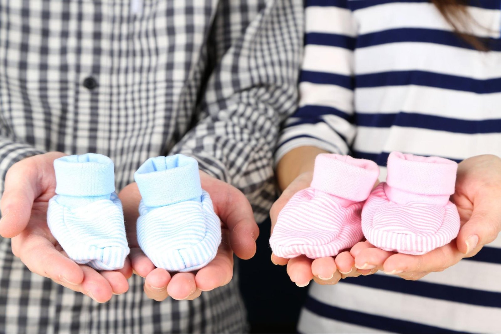 Fertility doctor explaining IVF twin pregnancy