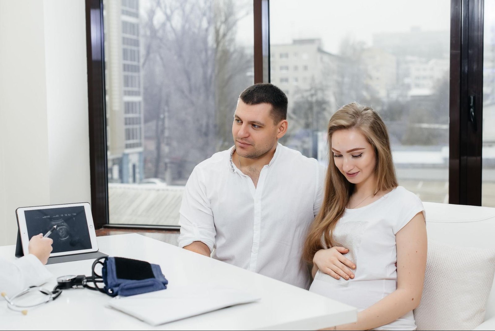 Fertility specialist explaining early pregnancy scan