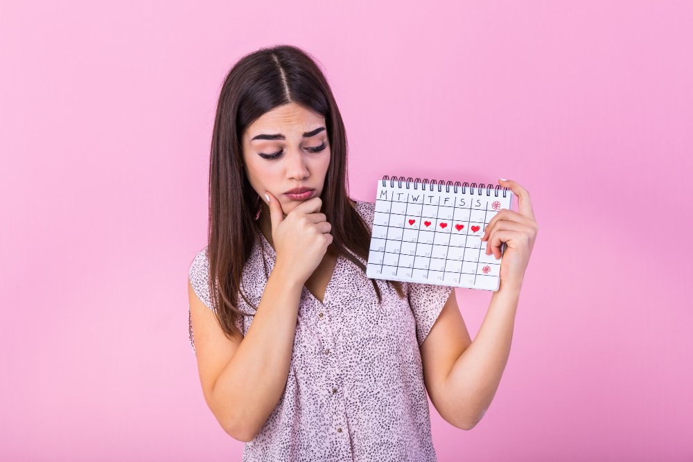 can fertility problems happen even with regular periods